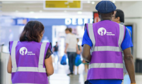 Volunteers walking in Centrale no face showing